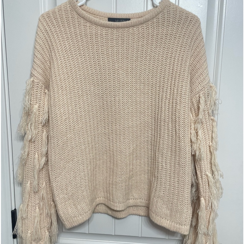 Sweater with fringe sleeves